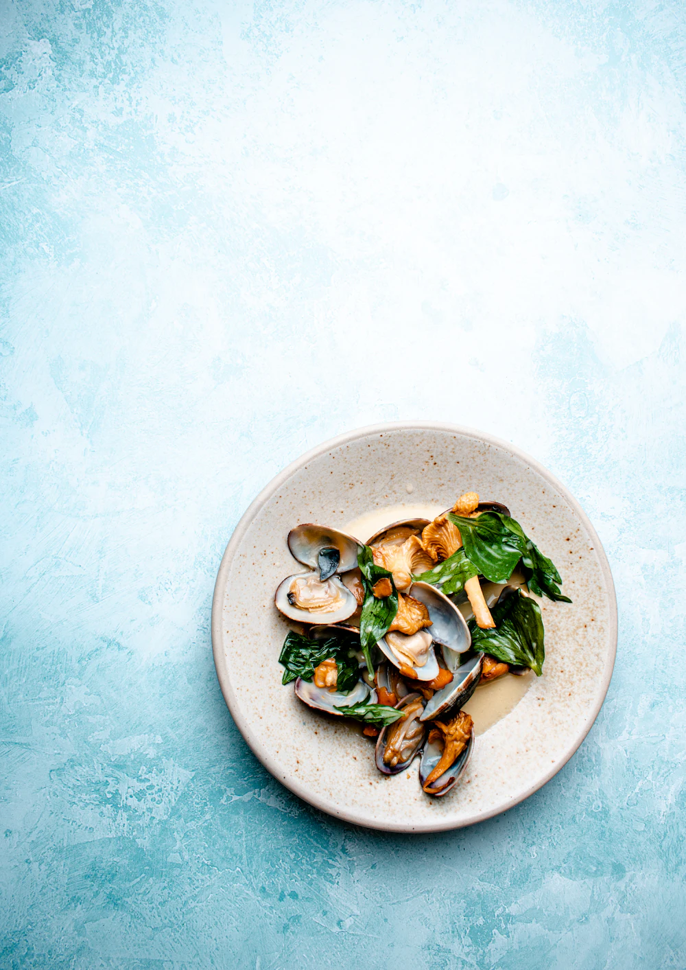 A seafood dish on a white plate